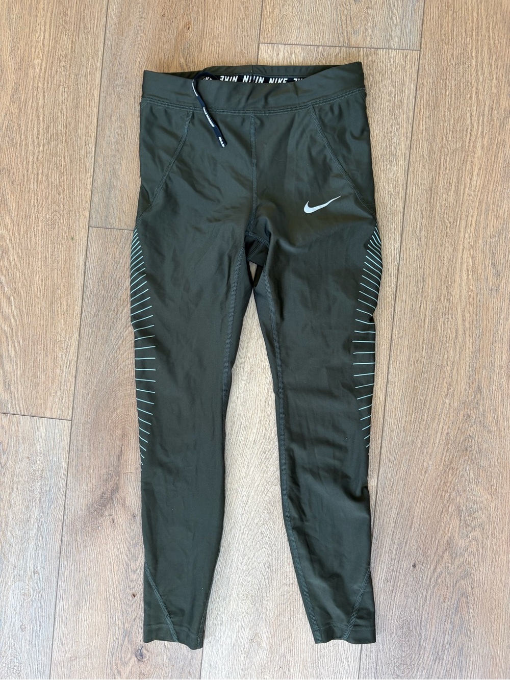Nike Olive Green Women's Performance Leggings with Reflective Swoosh
